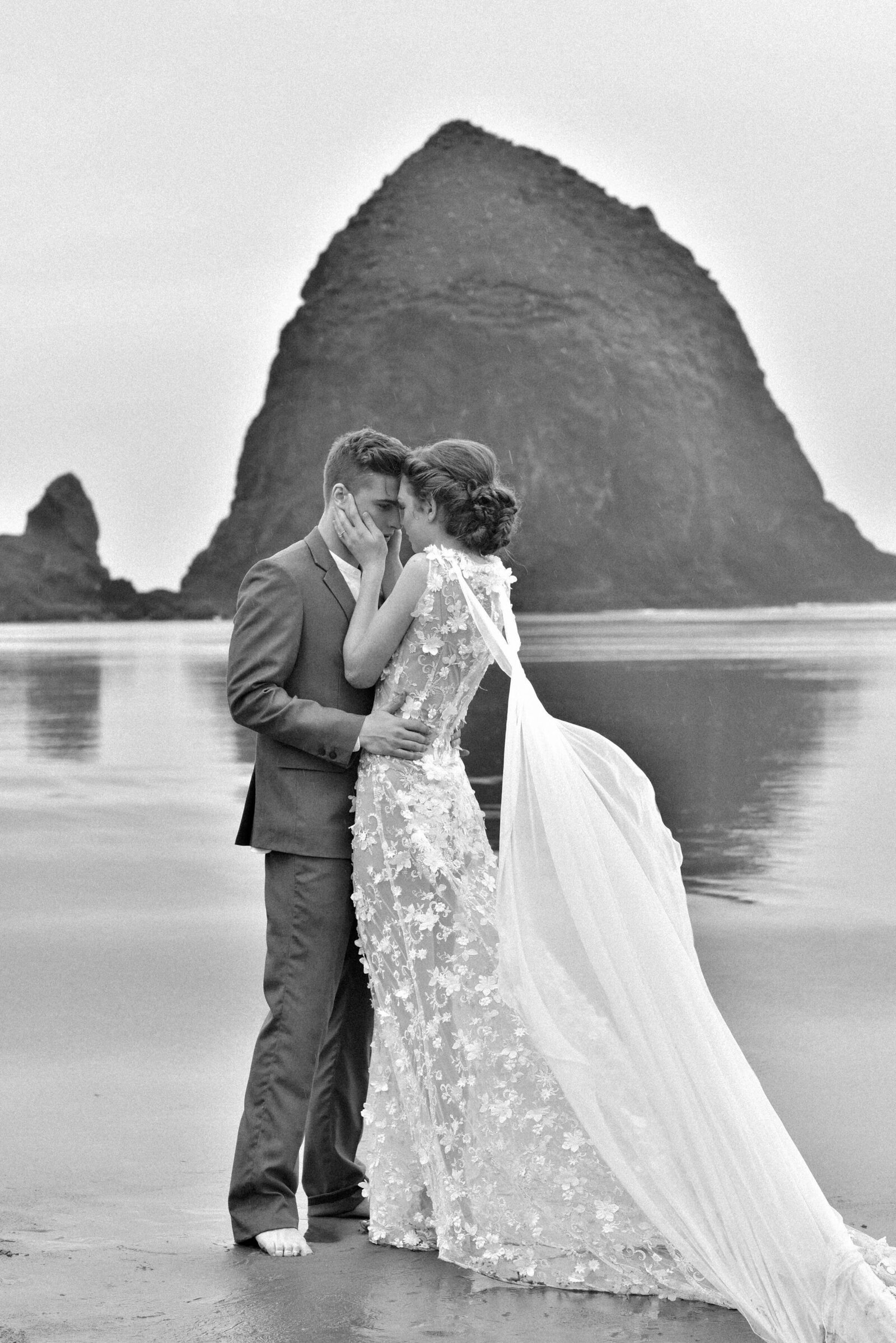 beautiful image of couple kissing in Cannon Beach
