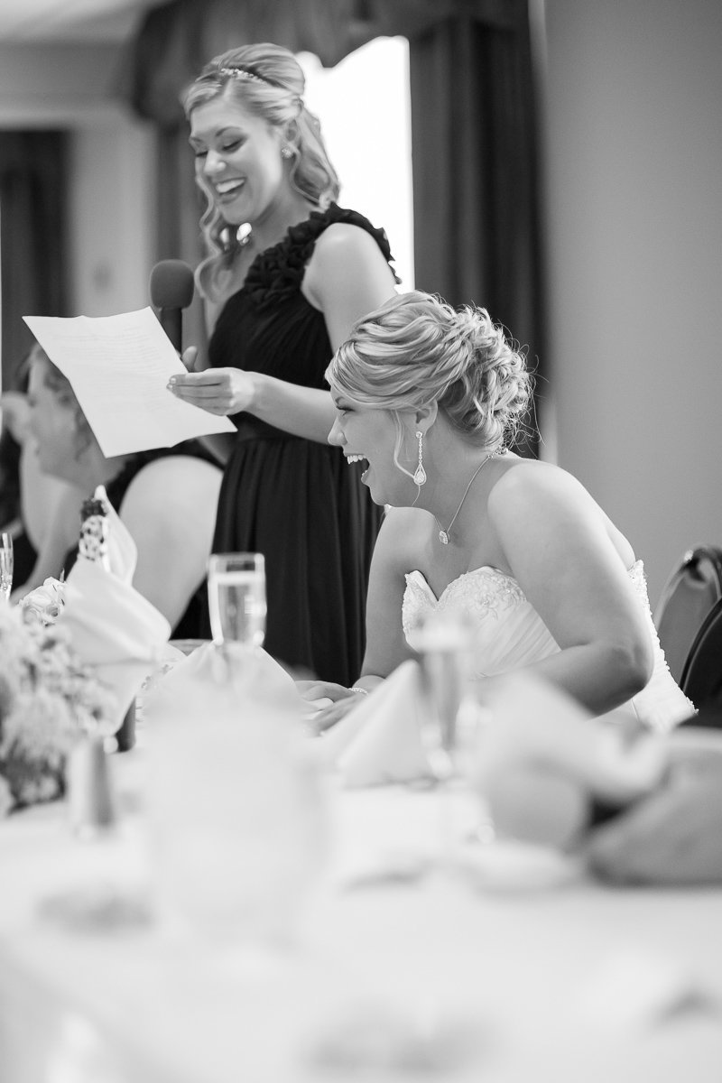 candid image at a wedding in maryland by husband and wife wedding photographers