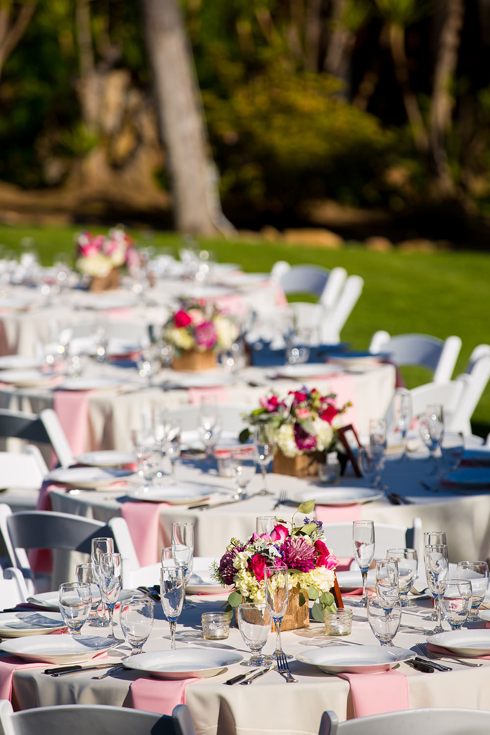 reception tables with pink details