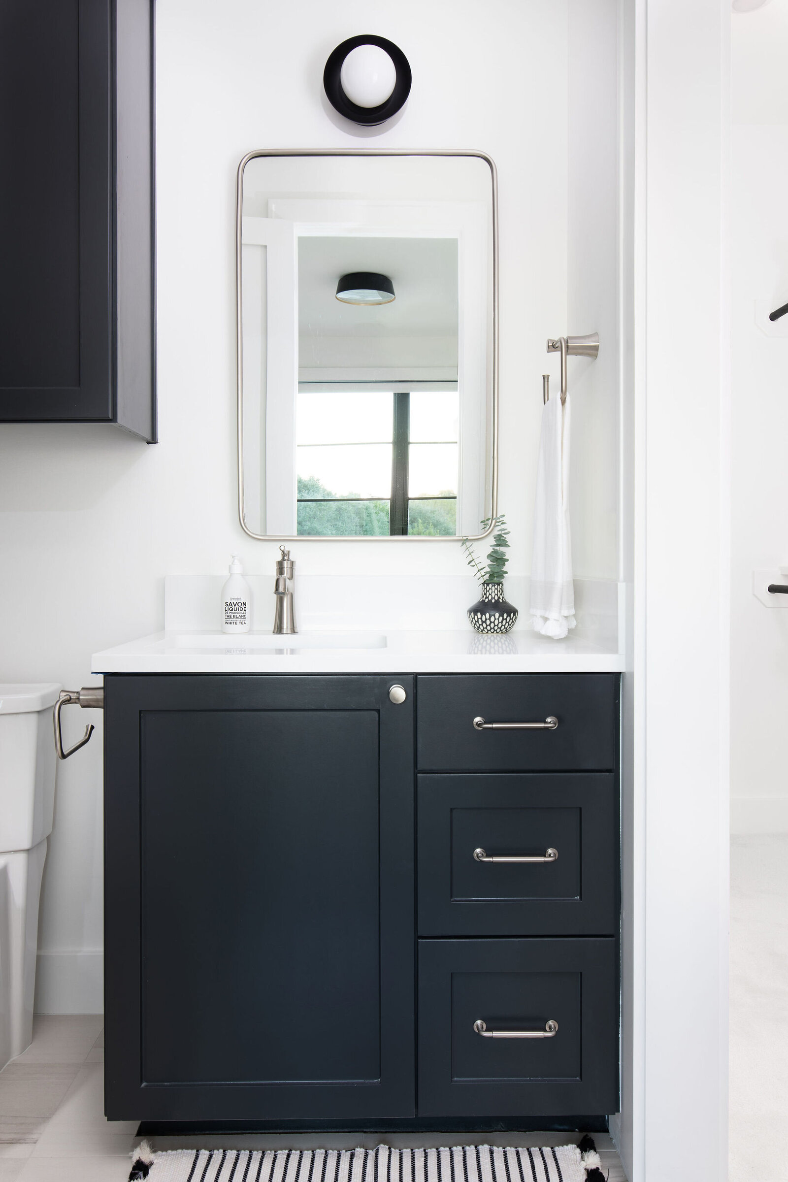 Black Vanity and White Counter Bathroom_Nuela Designs