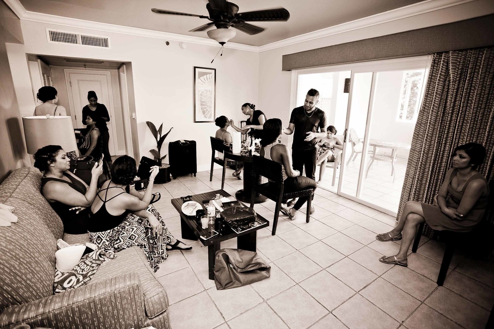 Family getting ready for the wedding  in B+W. Photo by Ross Photography, Trinidad, W.I..