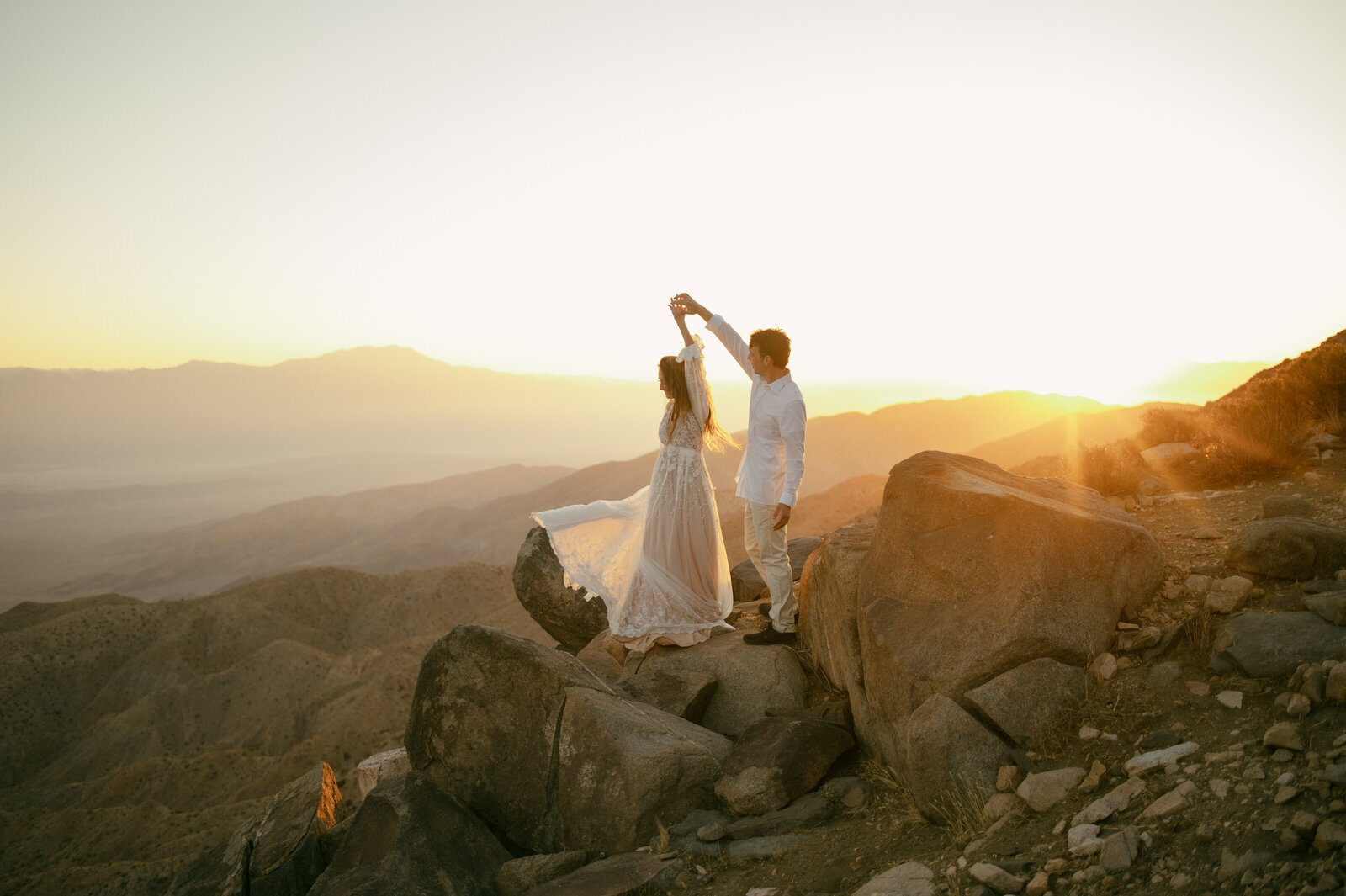a couple spinning on Key's View in Joshua Tree, California