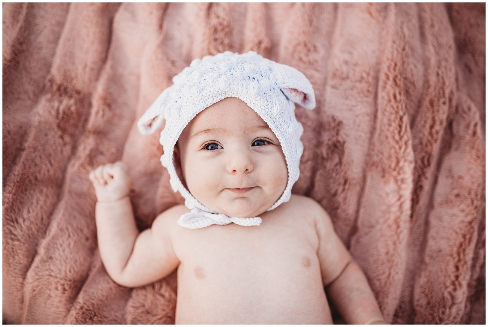 newborn baby girl on pink blanket with bonnett Emily Ann Photography Seattle Photographer