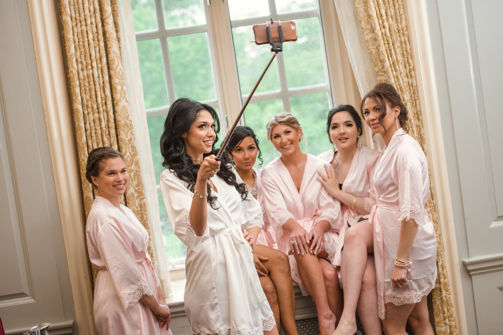 Bridesmaids selfie with the bride at Glen Cove Mansion