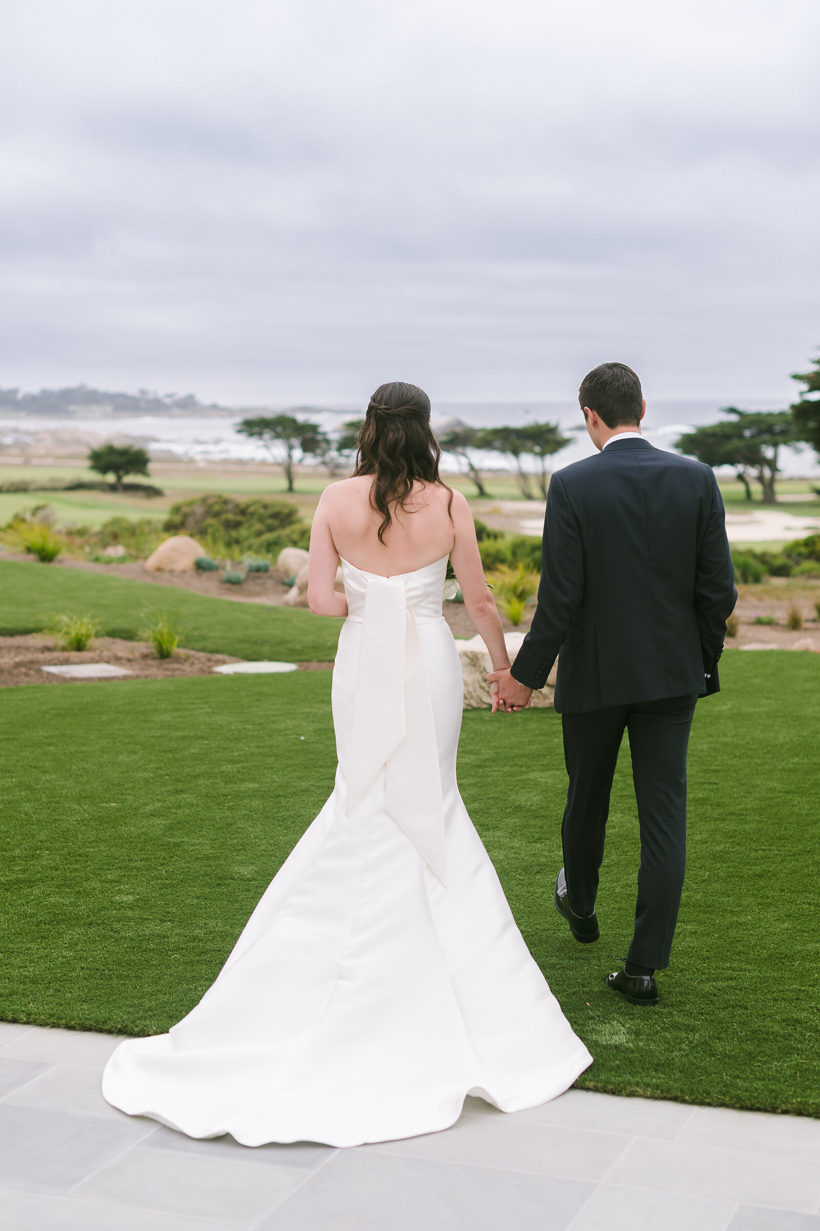 Bride and Groom Holding Hands at Private Home in Pebble Beach