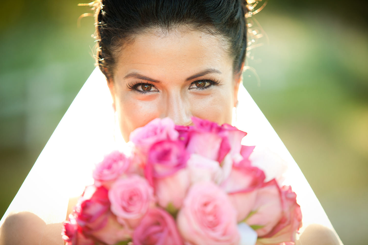 bride at the stunning wedgewood pink flowers