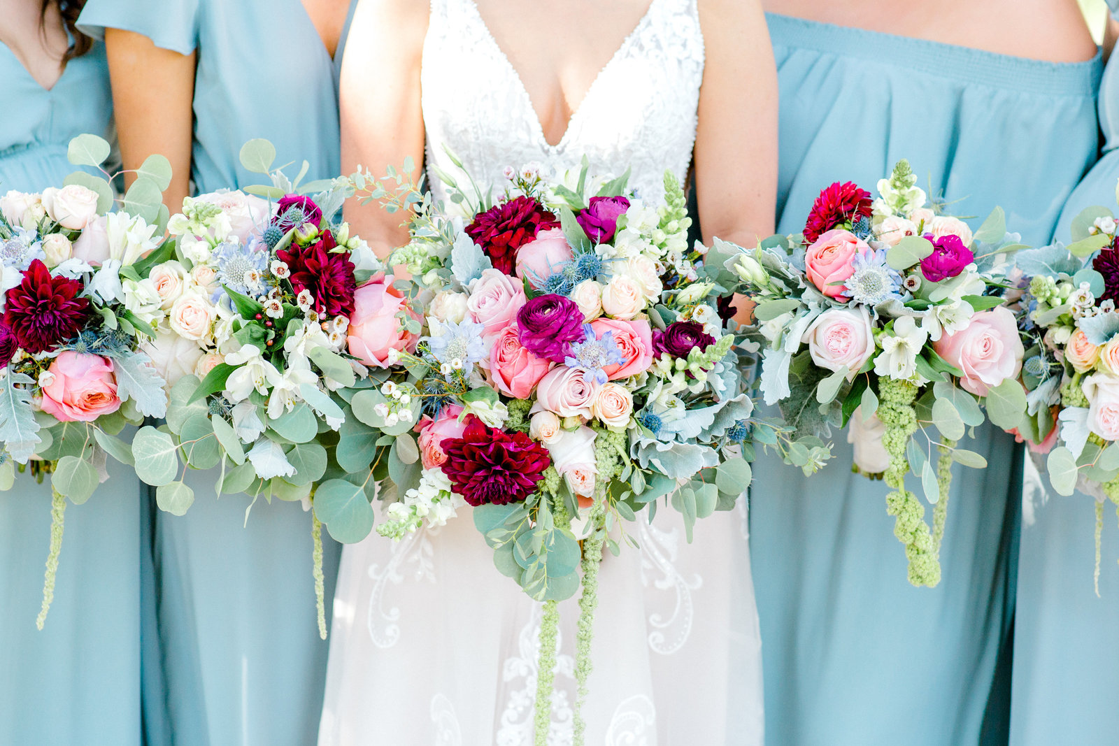 Bouquets with pastel colors and a pop of burgundy