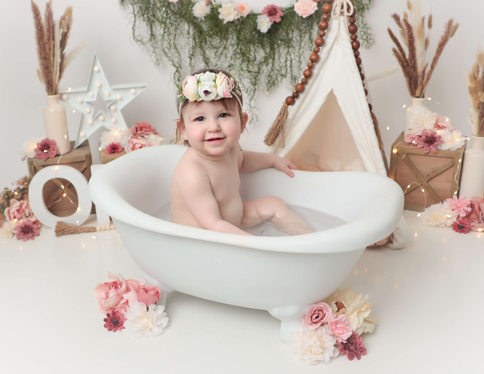 Sweet girl in a splash bath at our Rochester, Ny studio.