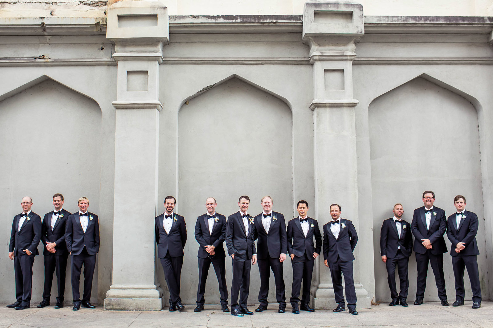 Groom and groomsmen stand in row, Grand Bohemian, Charleston, South Carolina. Kate Timbers Photography.