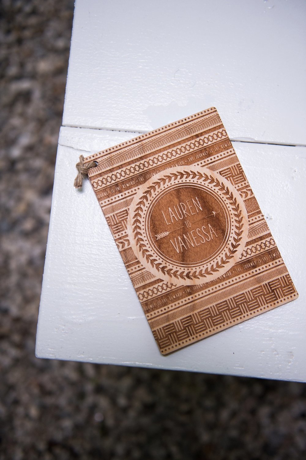 Wooden wedding ceremony program for Rustic same-sex wedding at The Barn at Walnut Hill in Maine