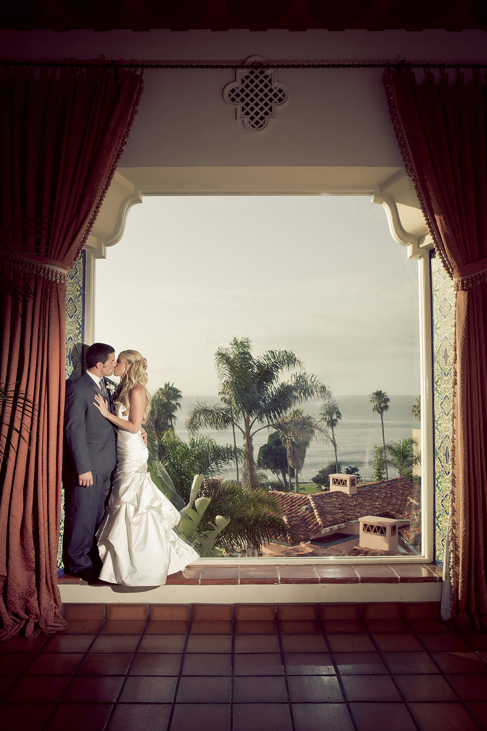 Window with a view wedding portrait at La Valencia.