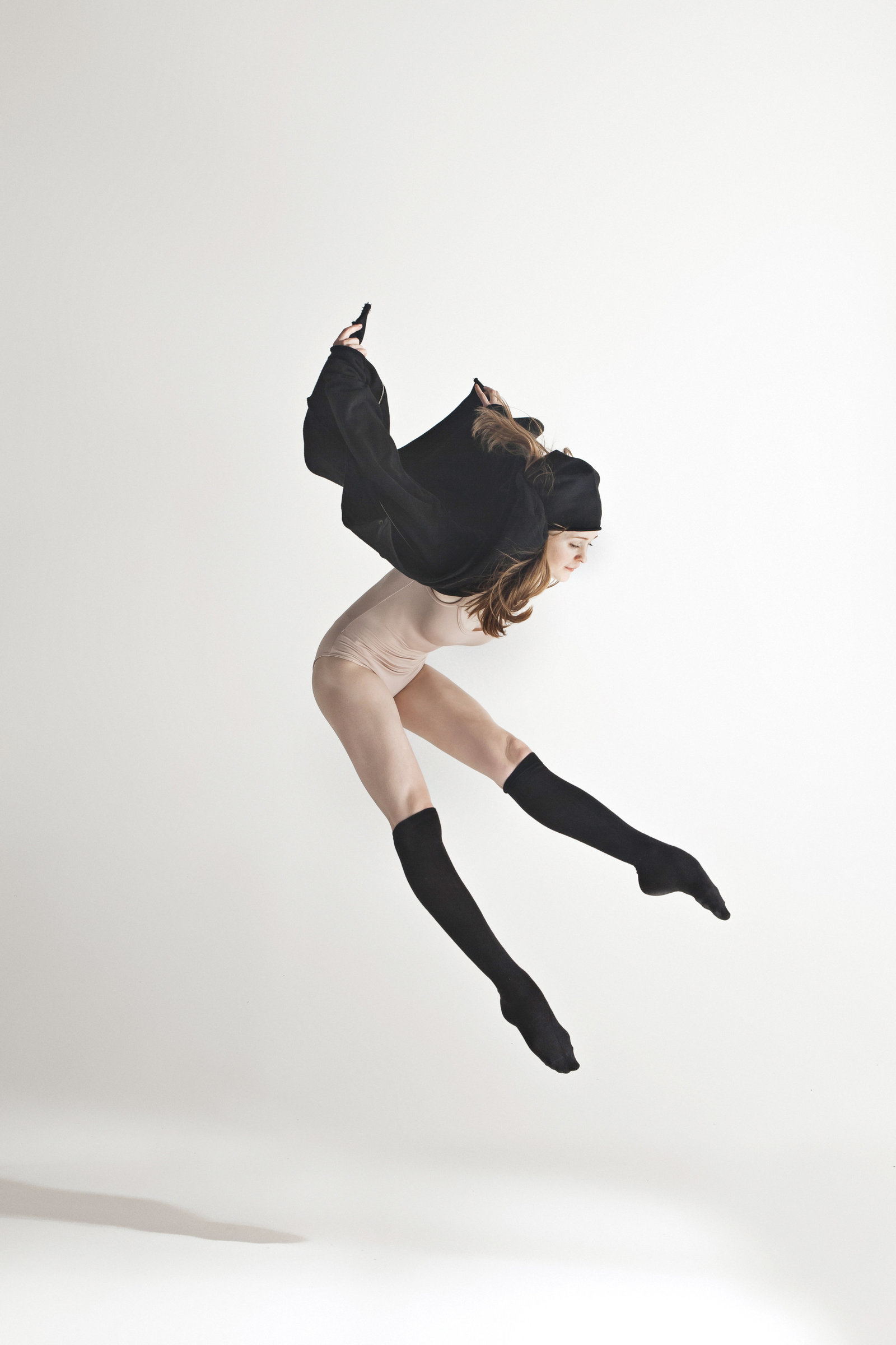 young-beautiful-dancer-in-beige-swimsuit-dancing-P473NRM