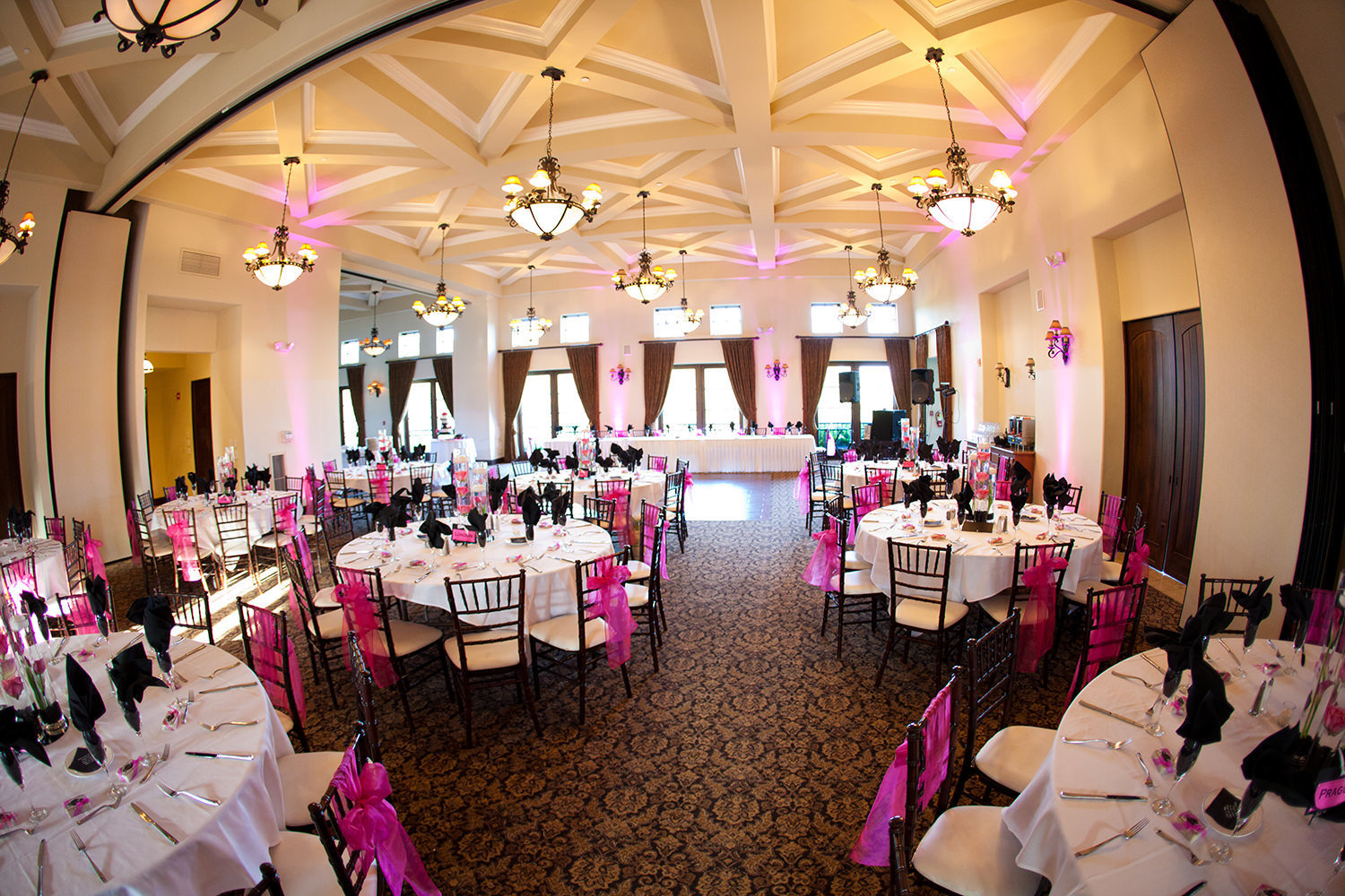 reception space at wedgewood pink uplighting