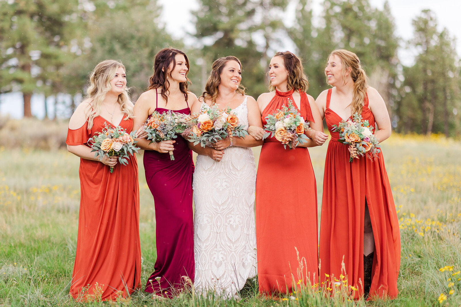 bridesmaids in field photo
