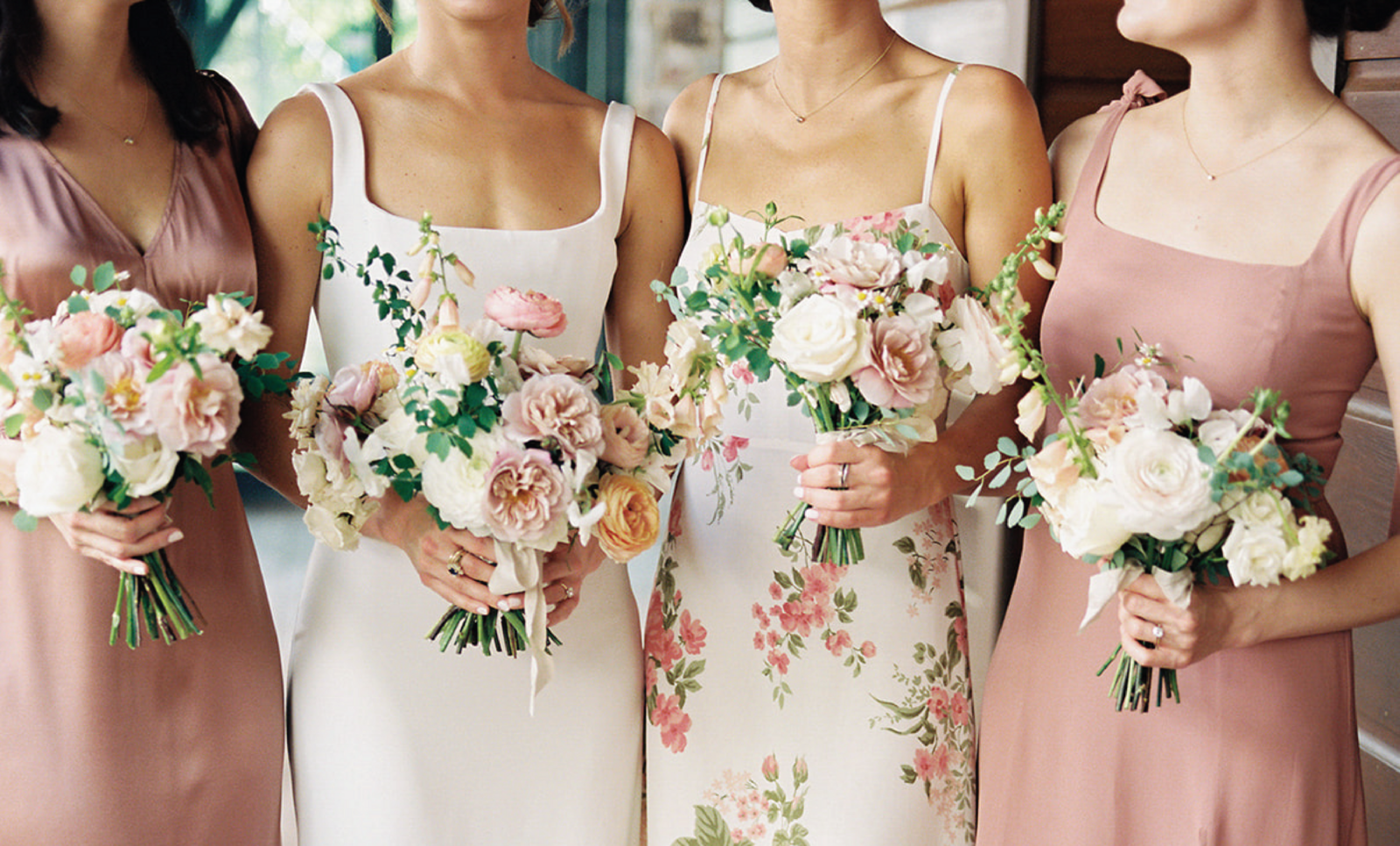 Mix match bridesmaid dresses with floral pattern, blush white apricot and yellow bouquets with light greend