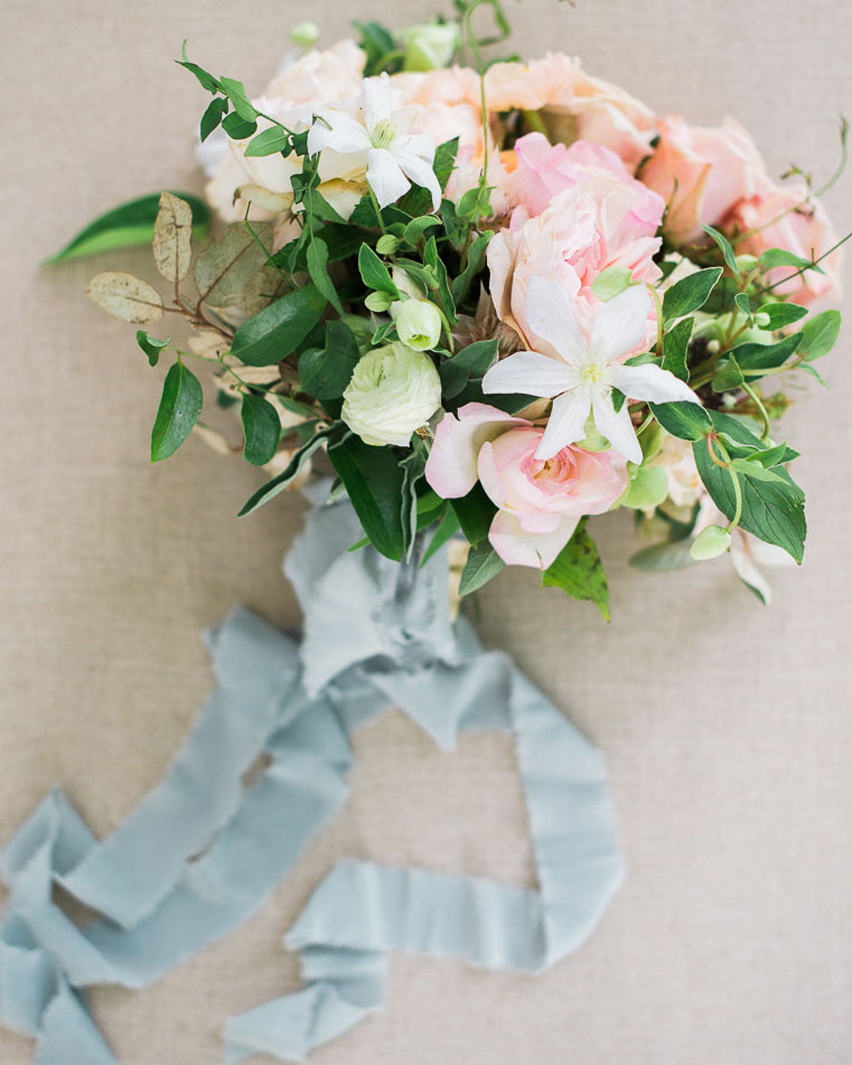 bouquet with blue ribbon