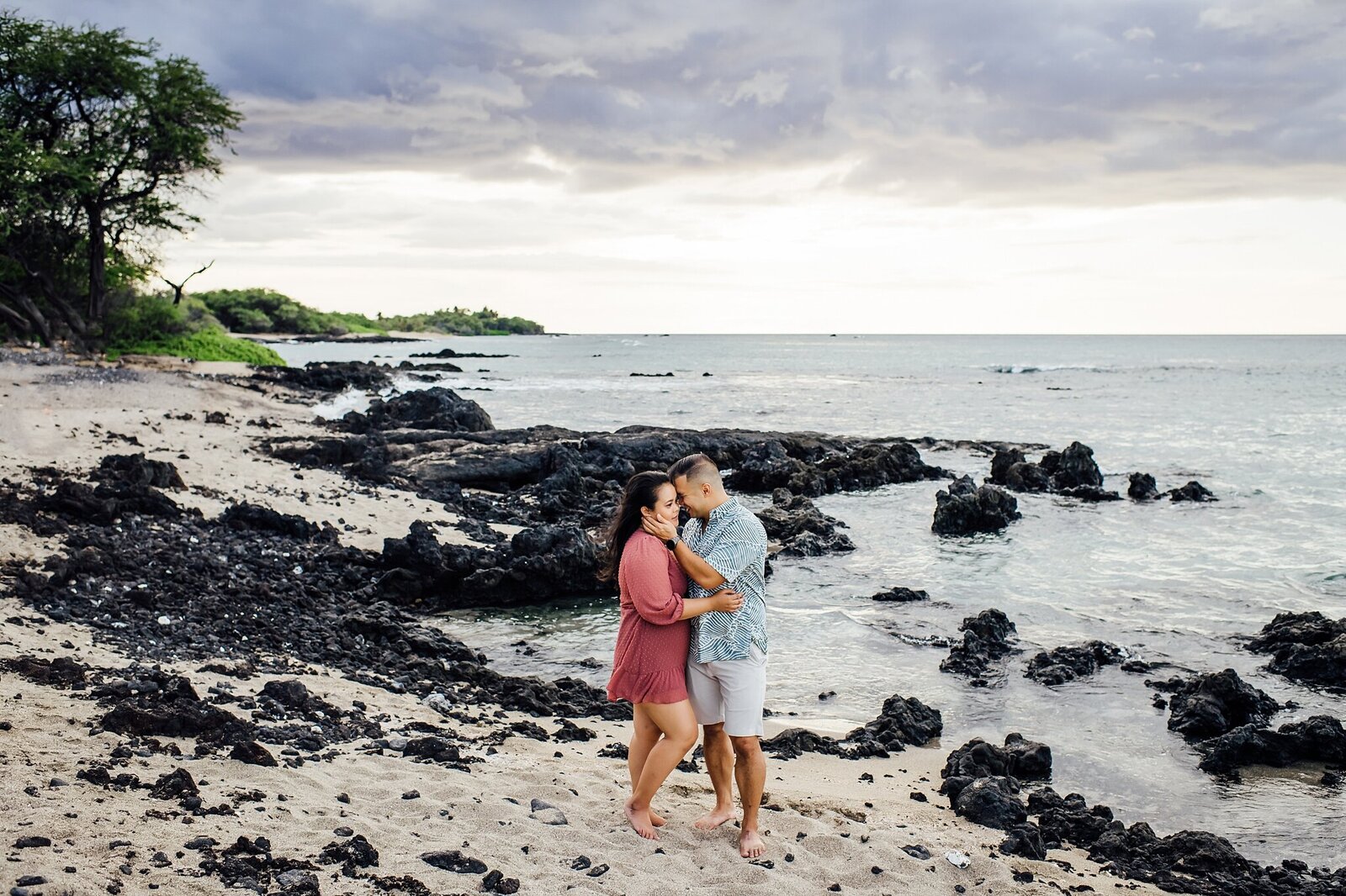 sweet moment during an engagement session in hawaii