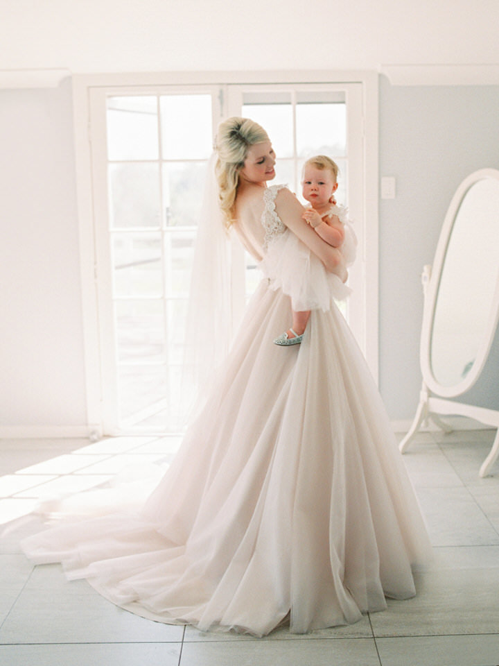 Bride and daughter before the ceremony