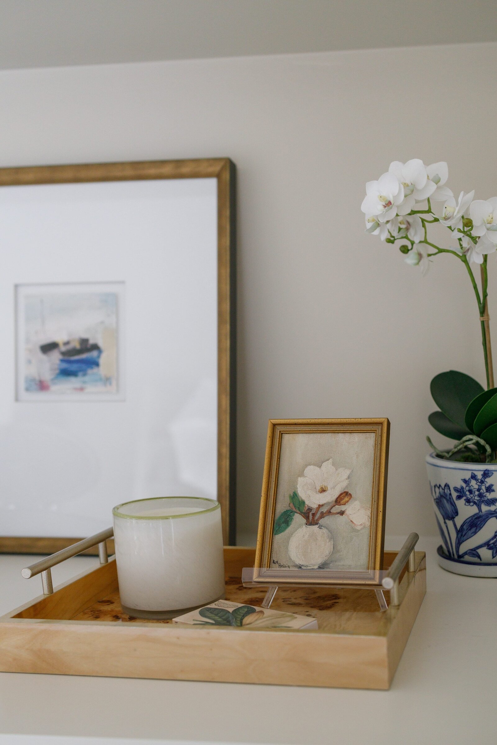 vision and hammer styling gold picture frames and white orchid flower