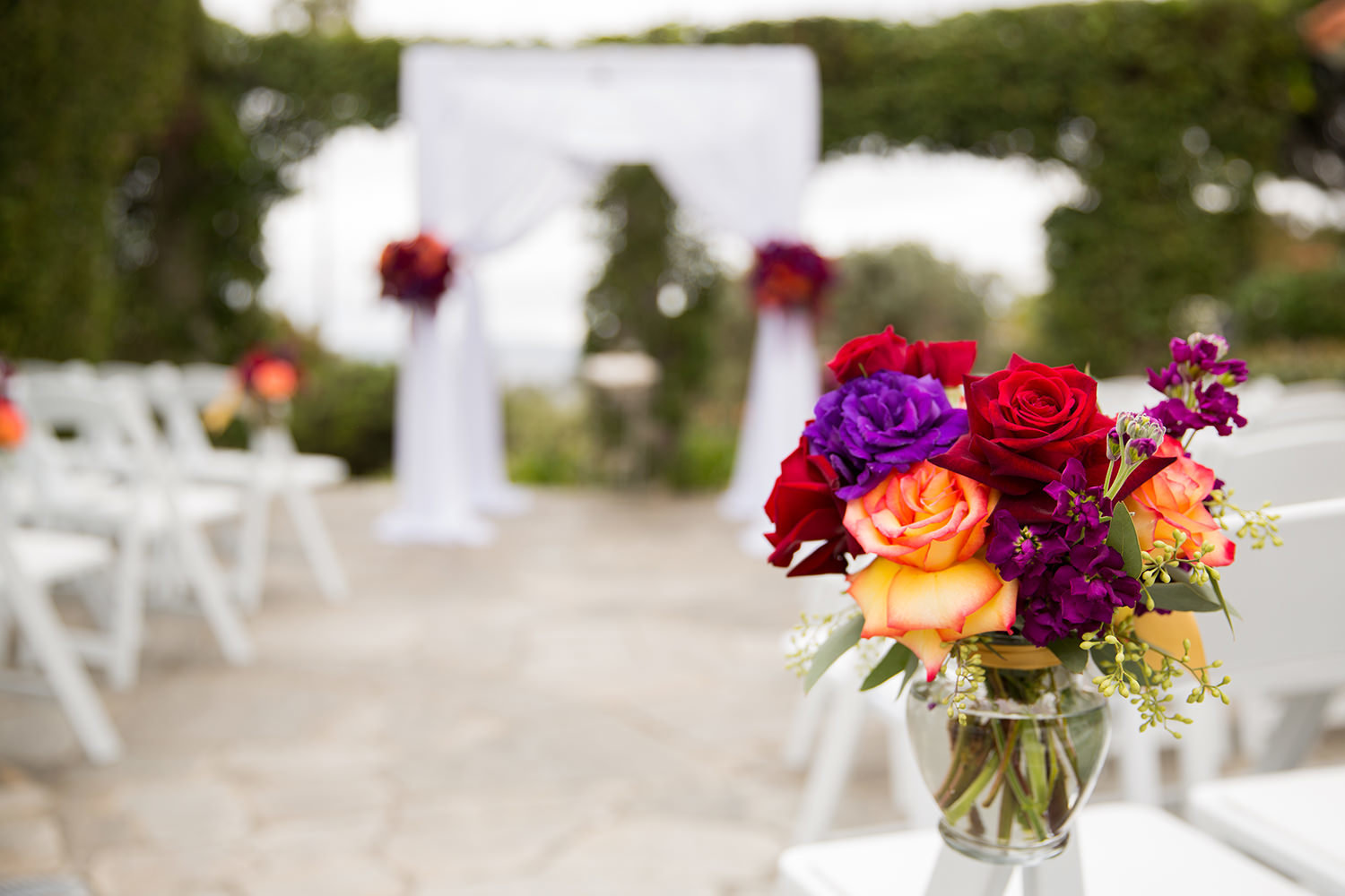 beautiful ceremony flowers purple and yellows