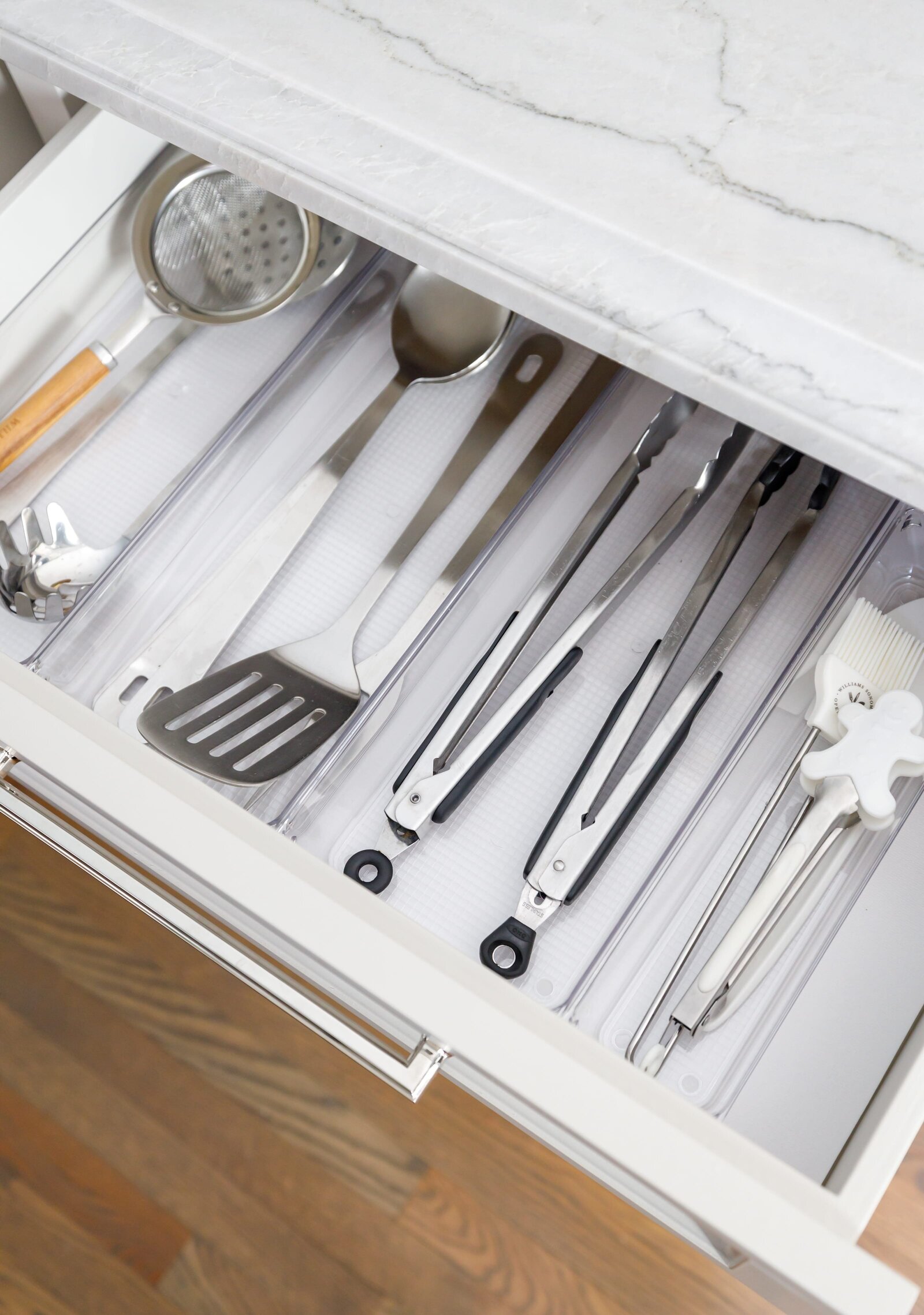 vision and hammer organizing drawer with cooking utensils