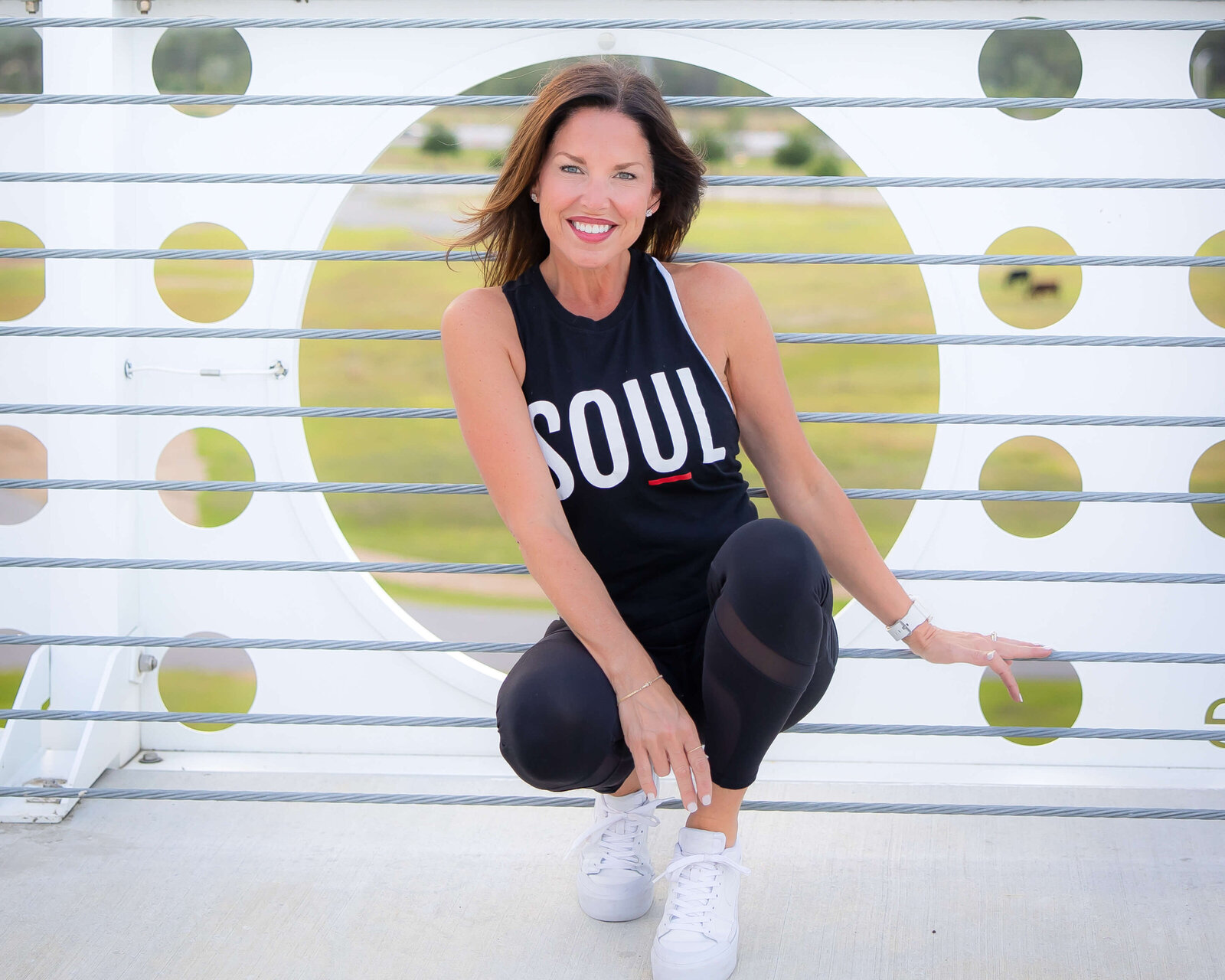 Personal branding photoshoot for a fitness professional in Orlando, Florida. Outdoor natural light session showcasing confident, vibrant poses.