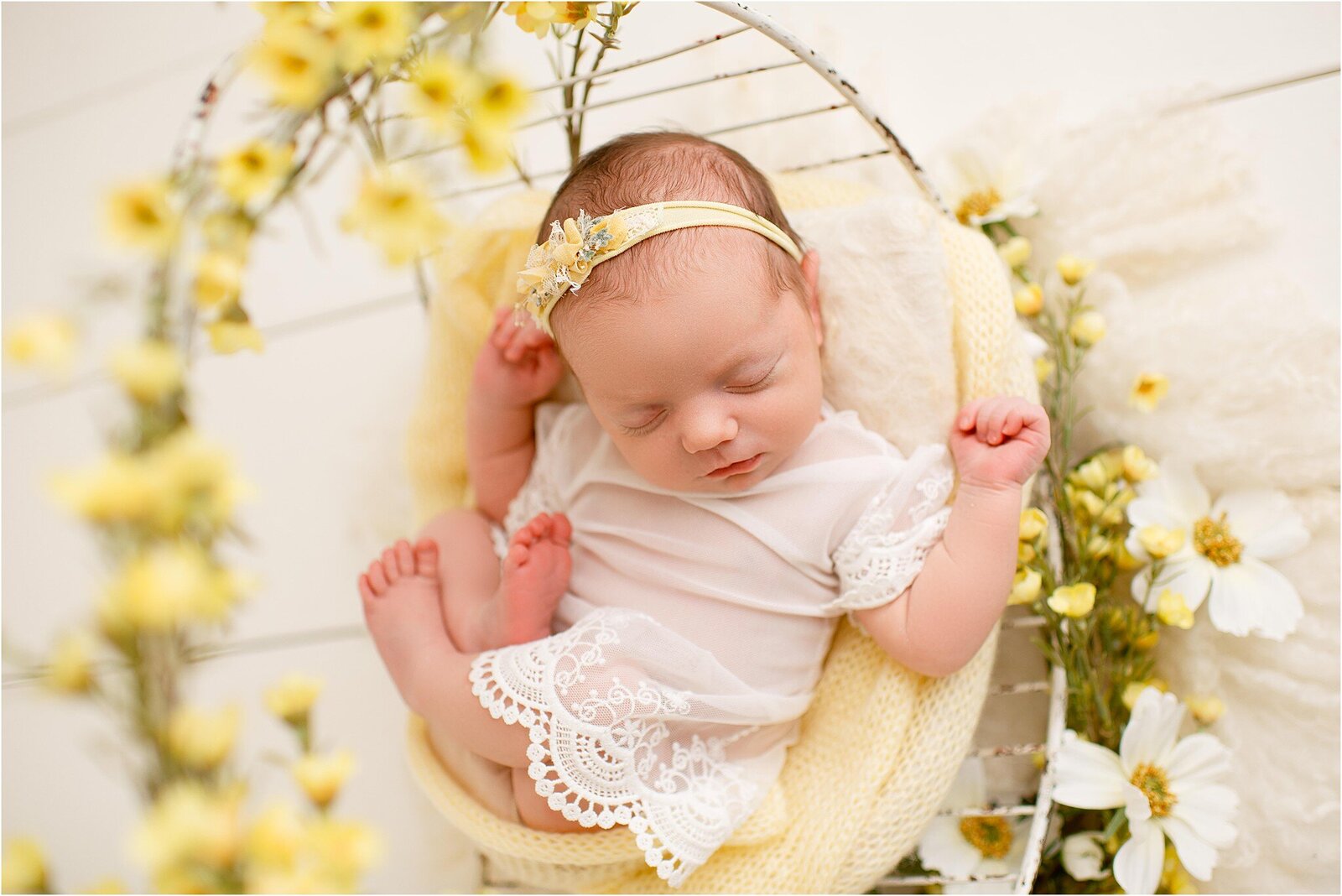 newborn baby in yellow