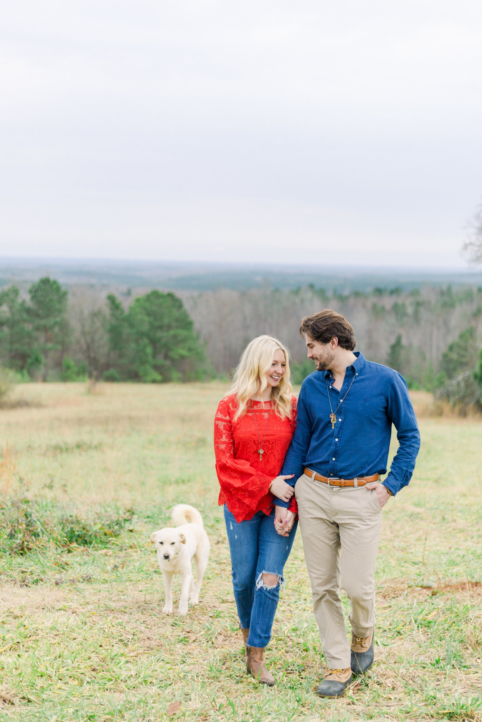 Newly engaged couple and their puppy  captured by Staci Addison Photography