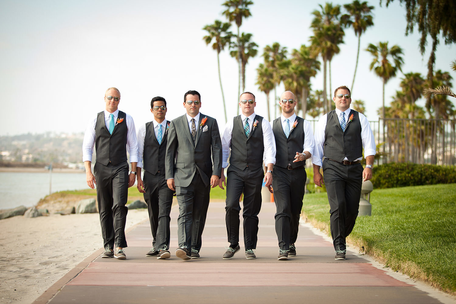 groomsmen walking on beach hilton mission bay