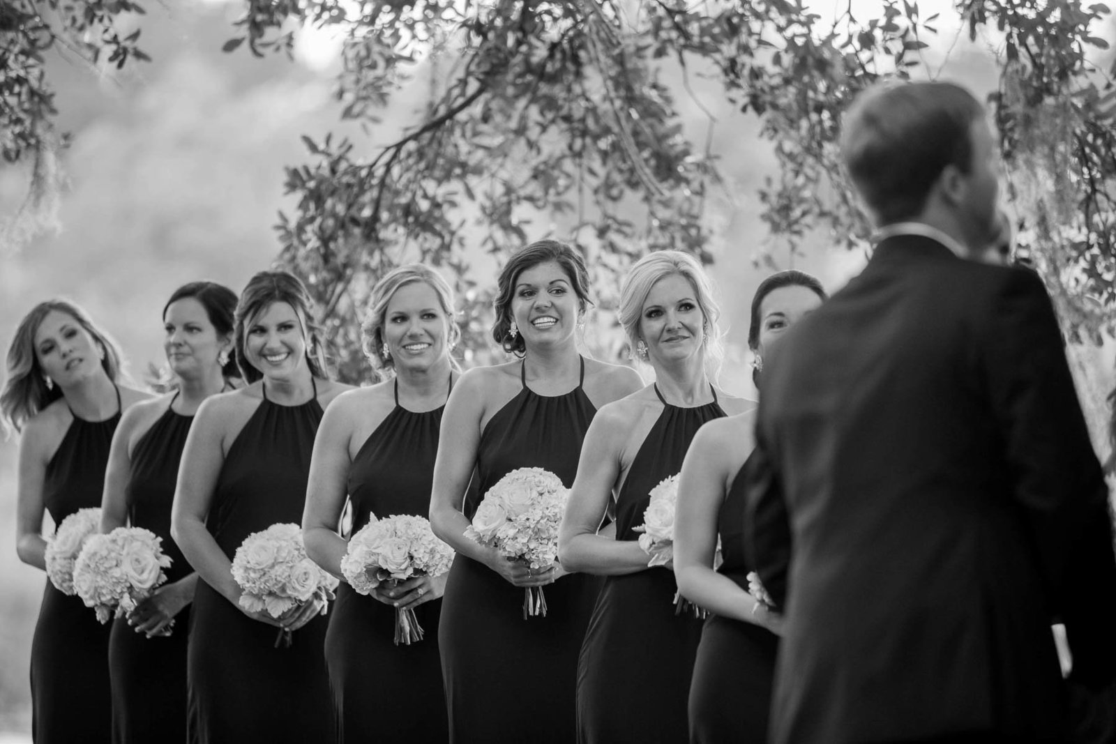 Bridesmaids stand in a row, Dunes West Golf and River Club, Charleston wedding photography.