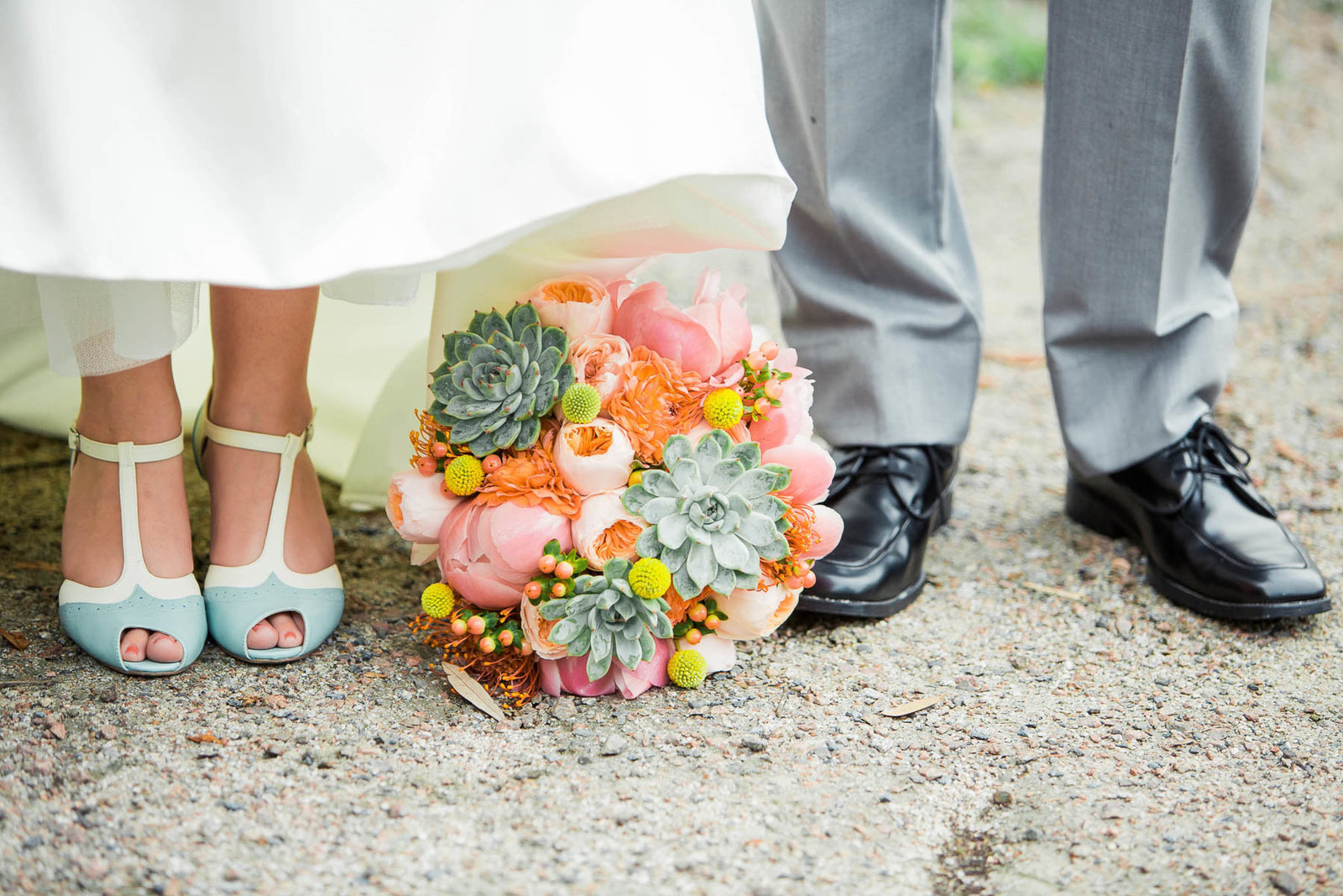 Bouquet is set between bride and groom's shoes, I'on Creek Club, Mt Pleasant, South Carolina