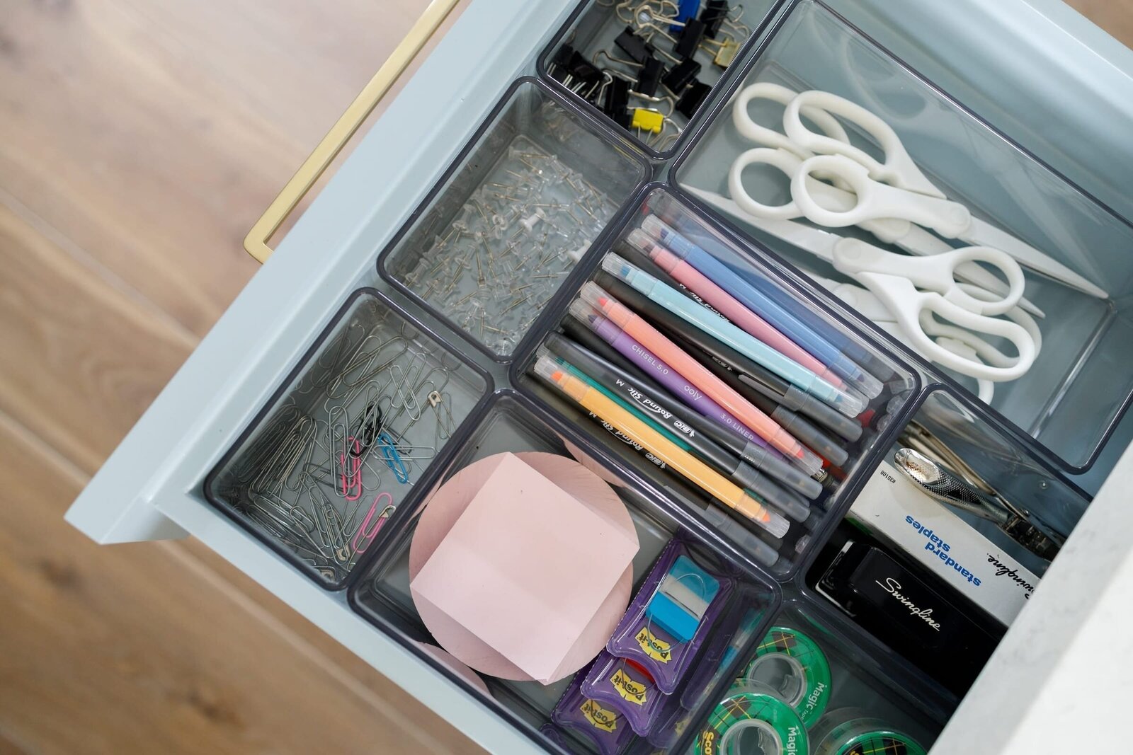 vision and hammer drawer organization with sticky pads and scissors