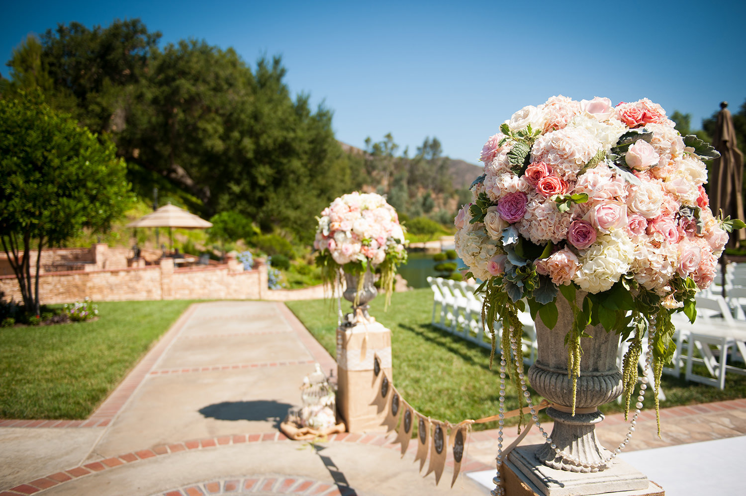ceremony space with white and pink flowers