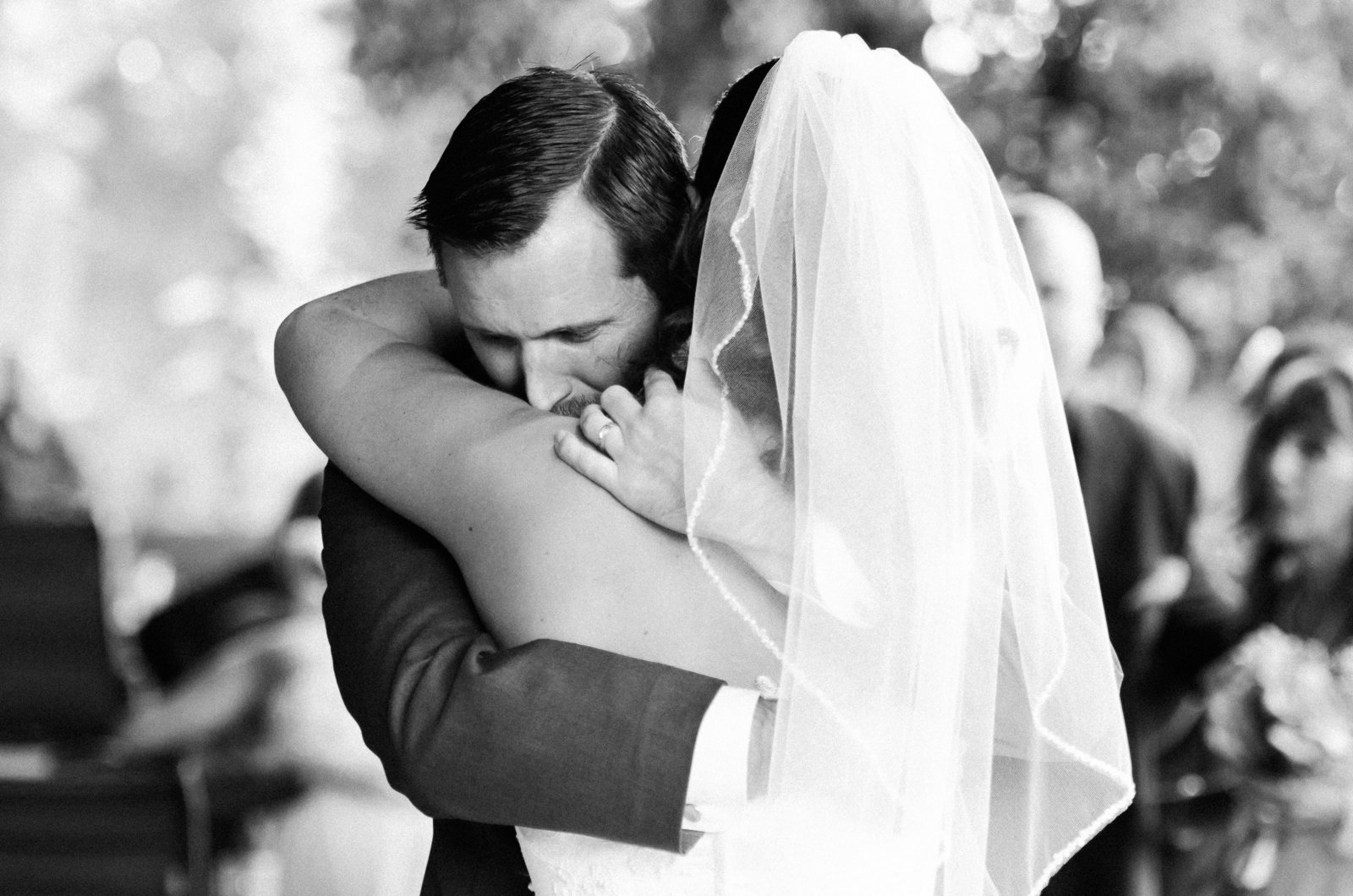 Green Valley Quail Creek Golf Club Wedding Black and White Photo of Bride and Groom Hugging | Tucson Wedding Photographer | West End Photography