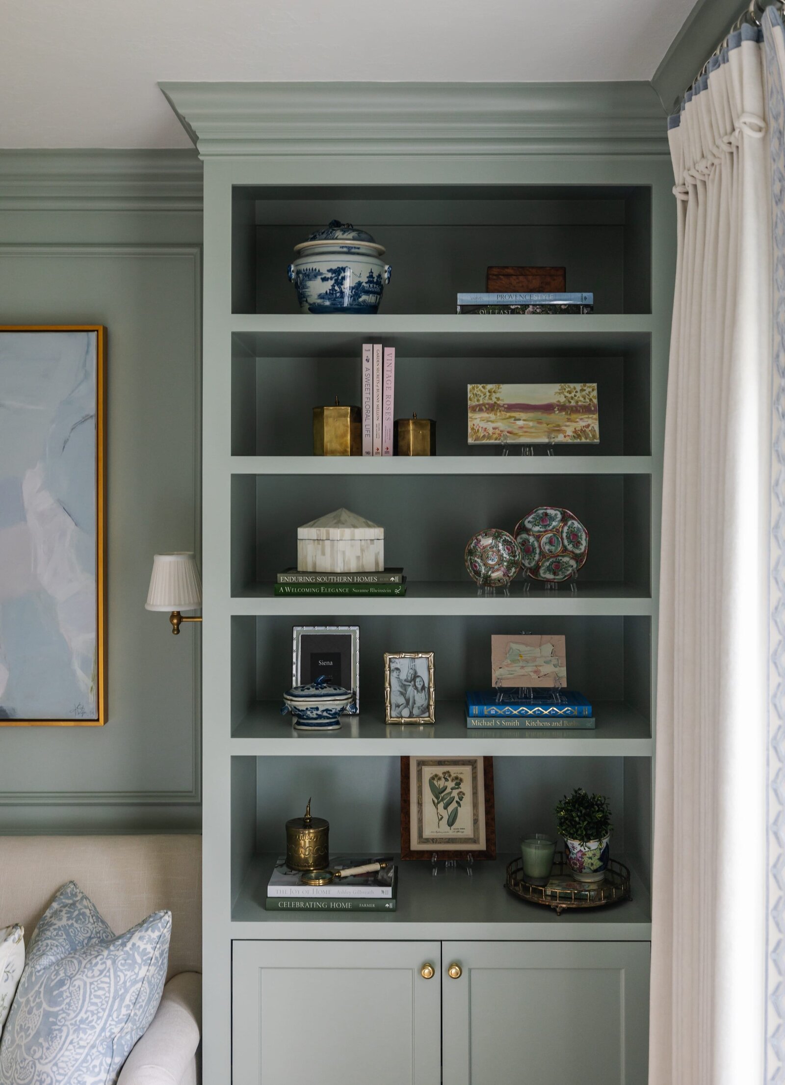 vision and hammer styling shelf that is painted green