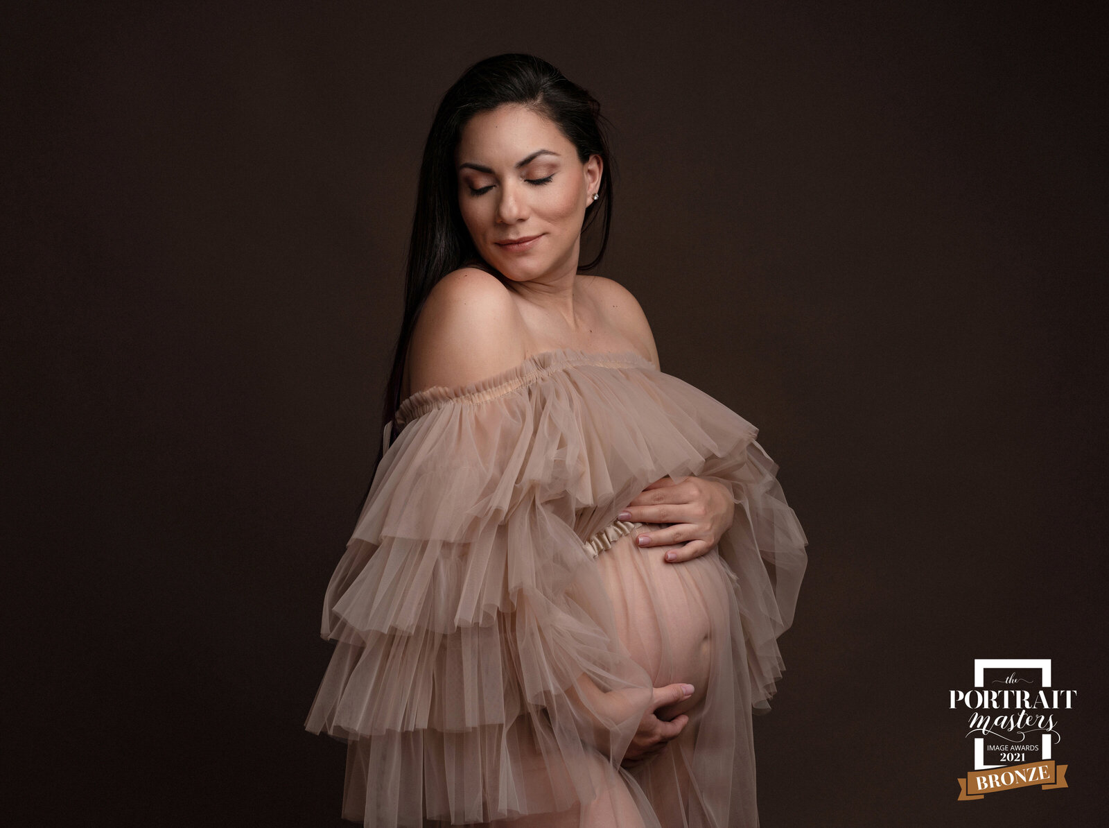 Portrait Masters Bronze maternity image bare belly tulle gown