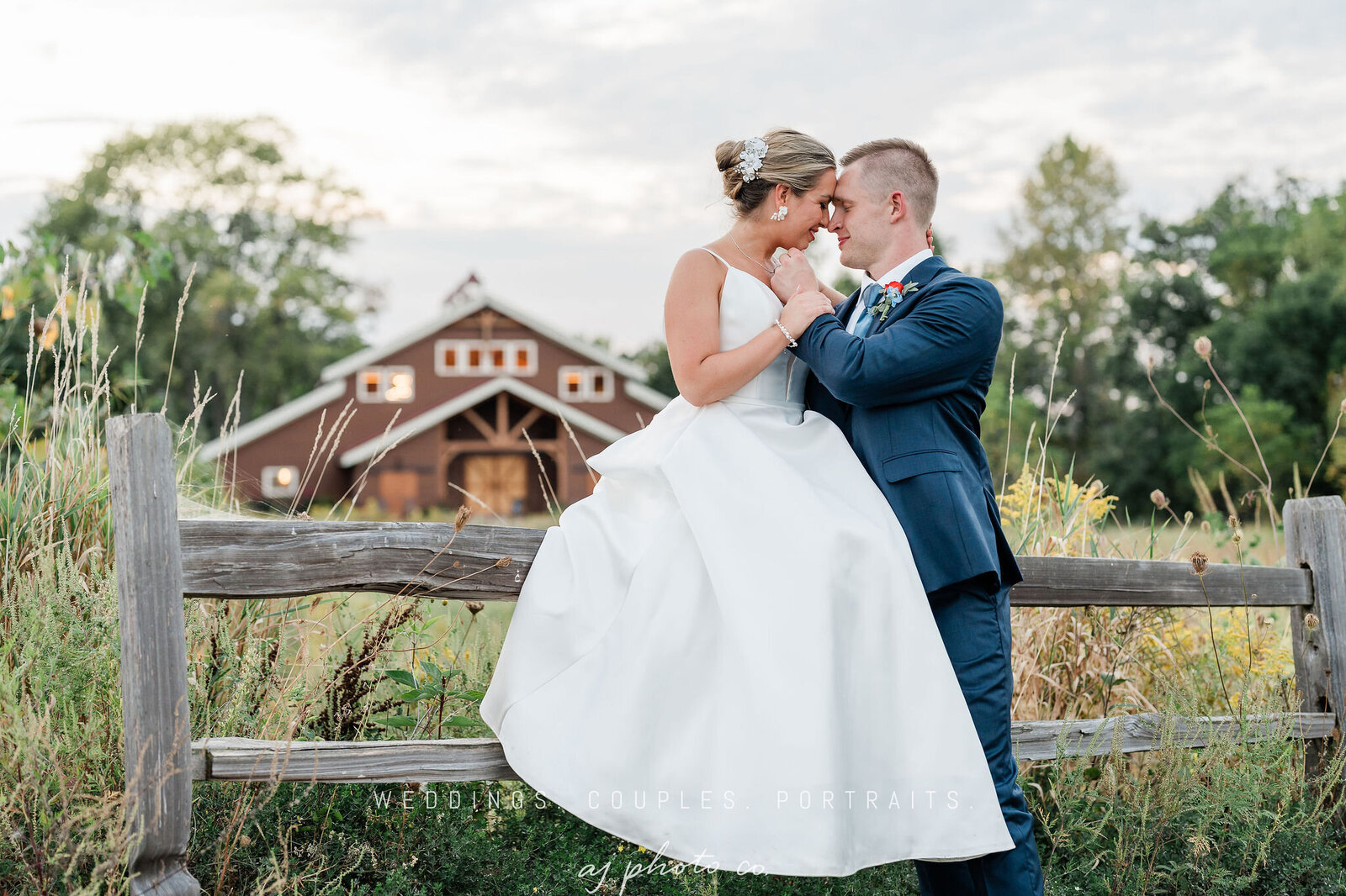 bride and groom looking at each other at barnwood events in madison, winconsin.