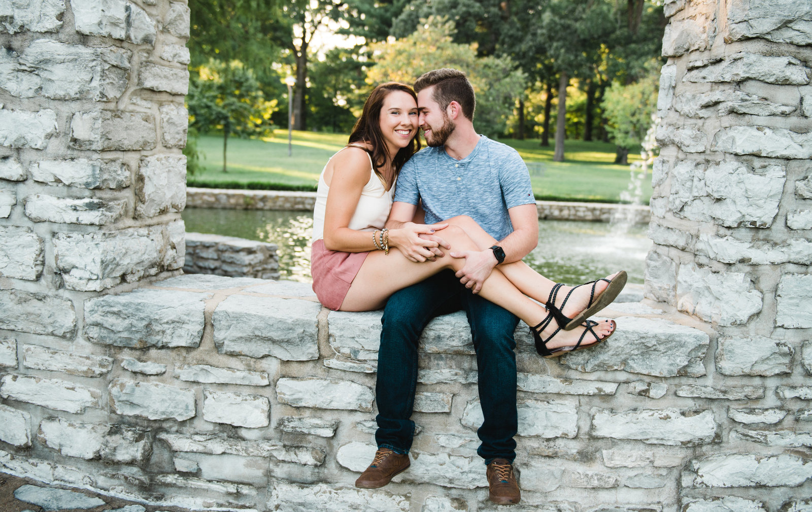 couple kissing each other during engagement photos