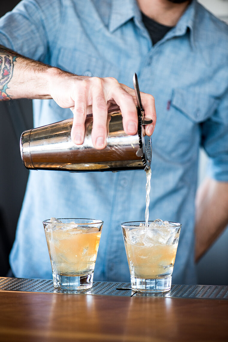 Bartender-Pouring-Cocktails