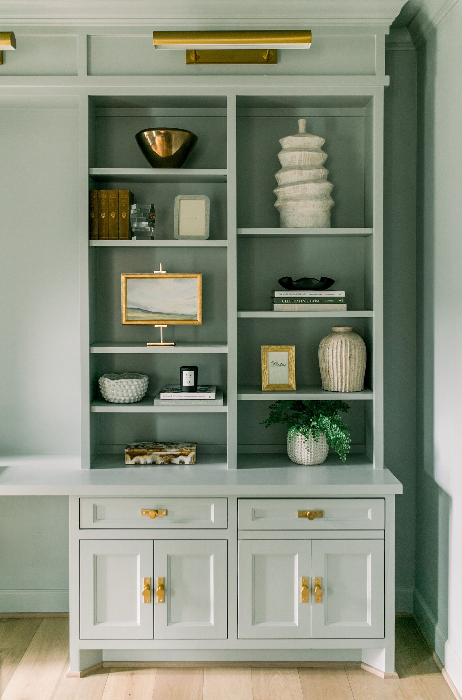 vision and hammer styling shelf painted light green and gold light fixture