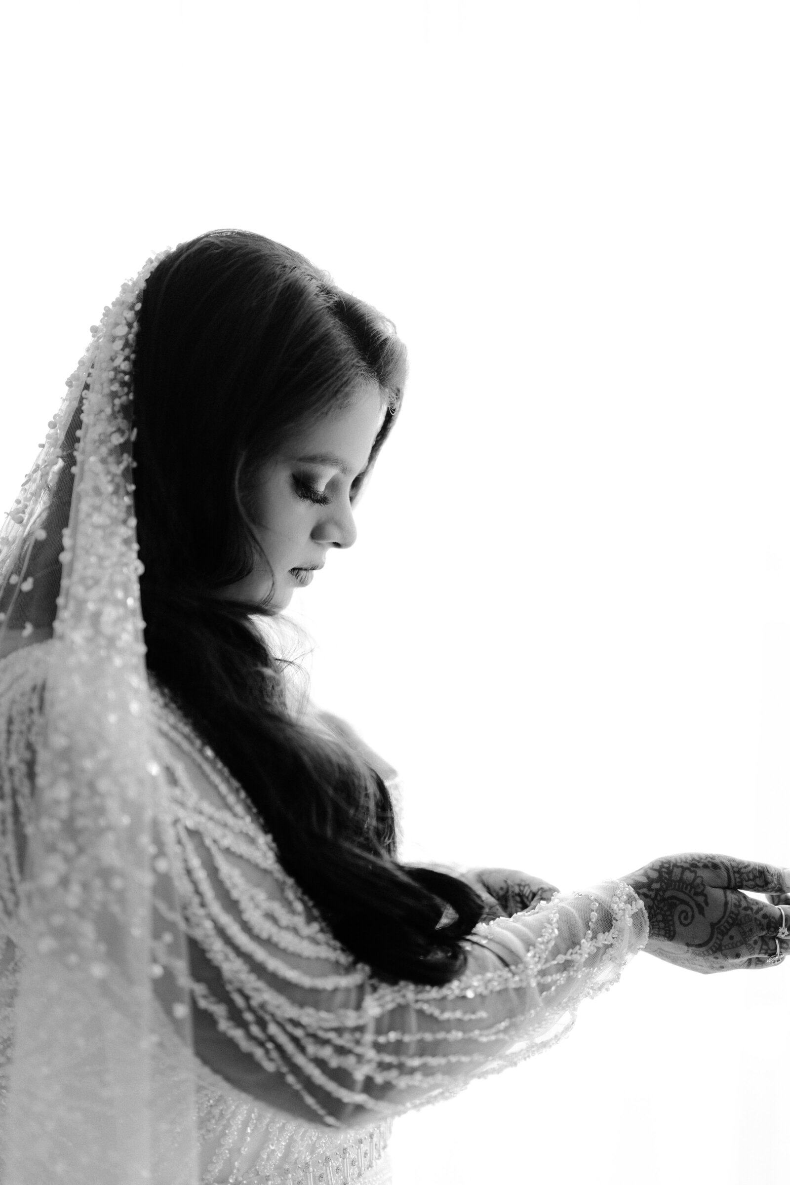 Black and white photo of a bride getting ready in Canberra