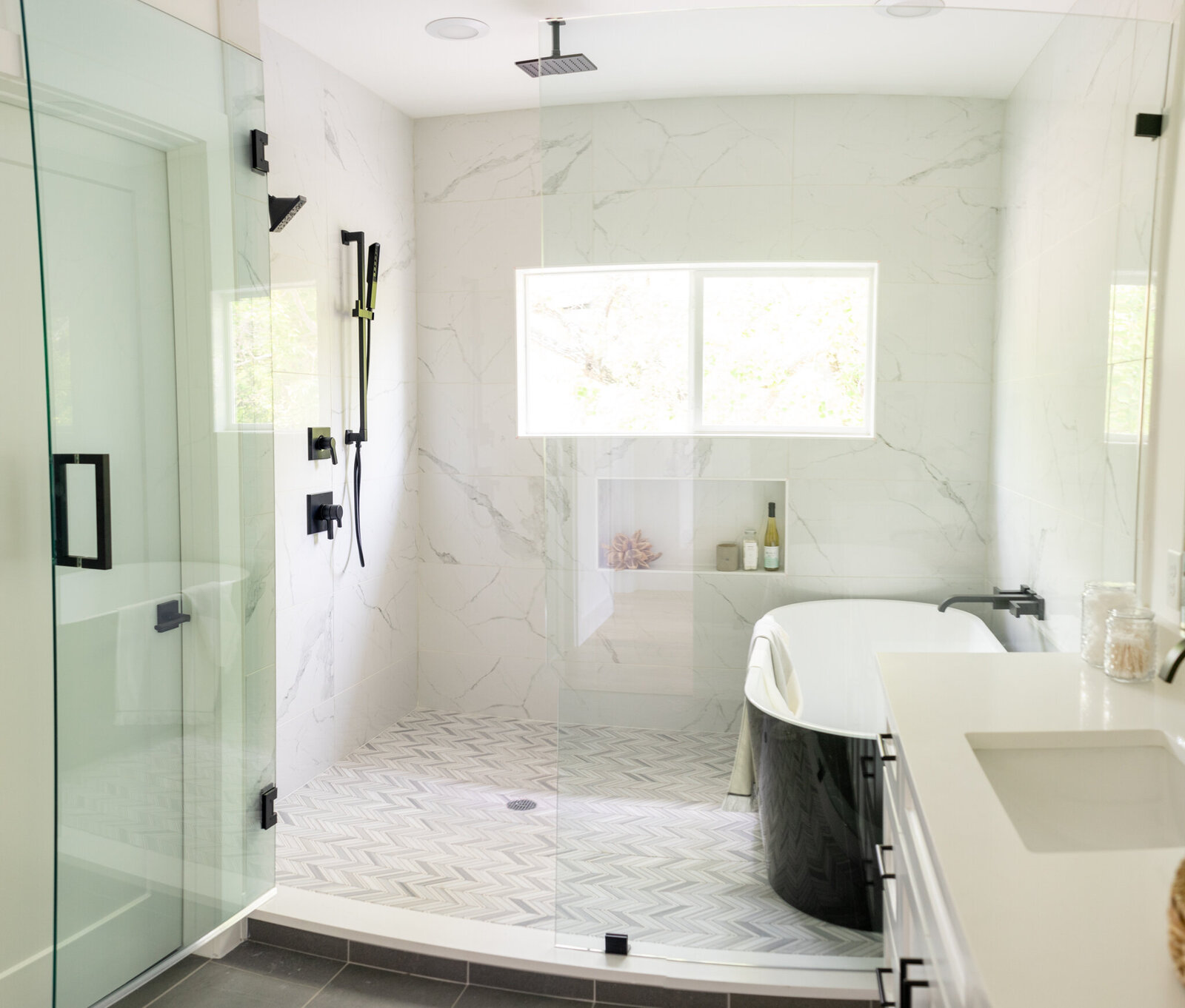 wetroom shower with black tub Nuela Designs