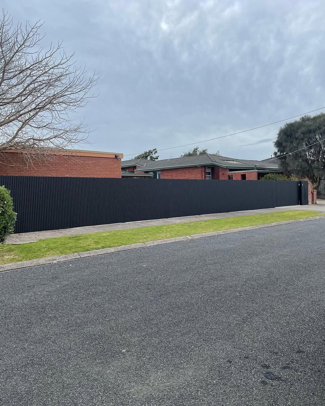 Stylish timber slat fence by AR Construction in Warrnambool