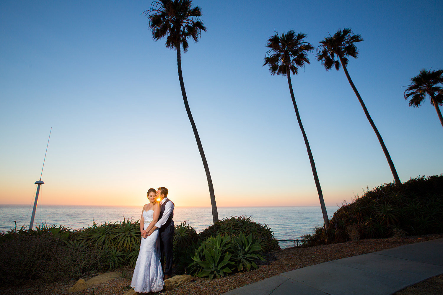beautiful sunset picture with bride and groom at martin johnson house