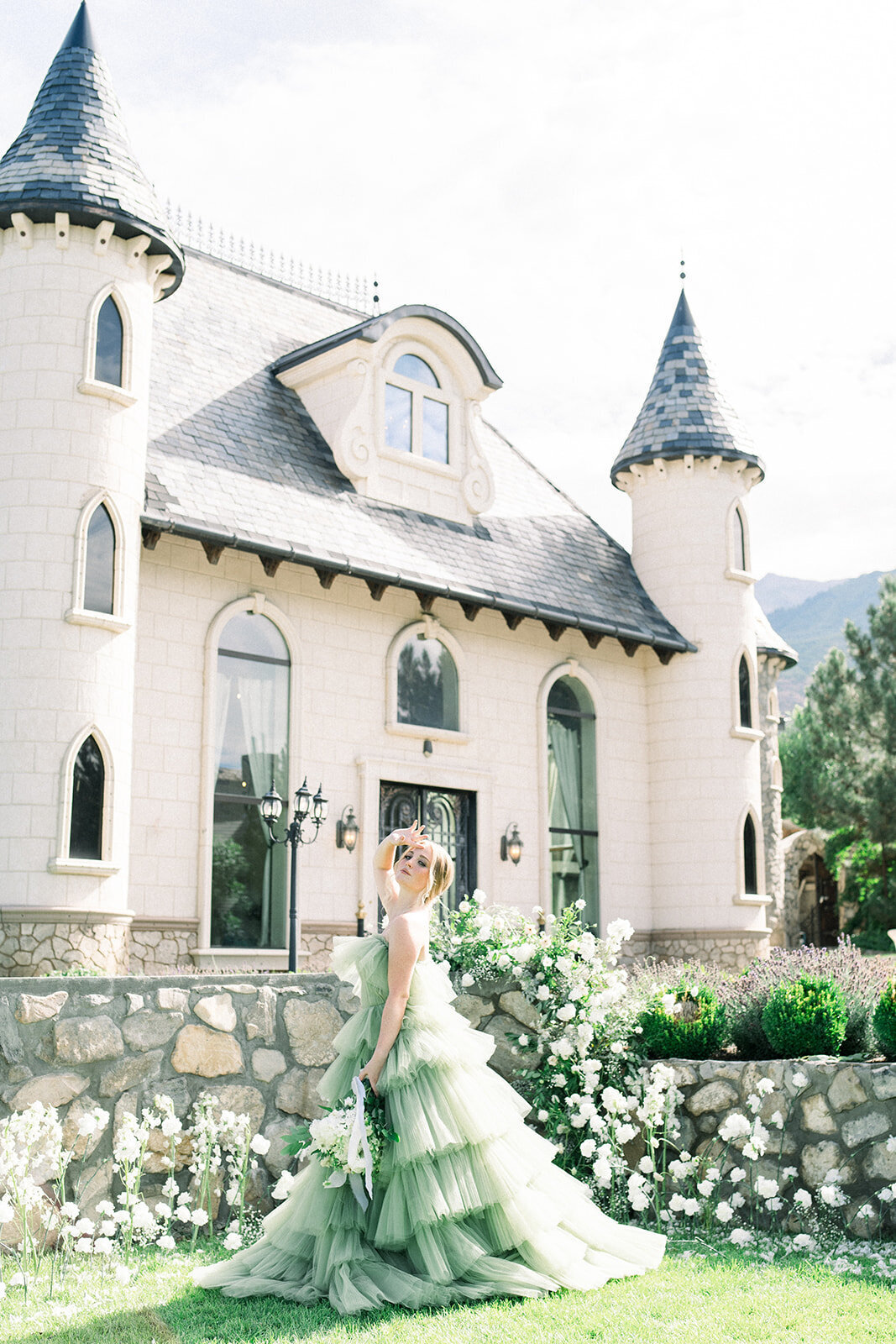 Bride with wedding bouquet at White Swan Castle in Granite Bay, CA