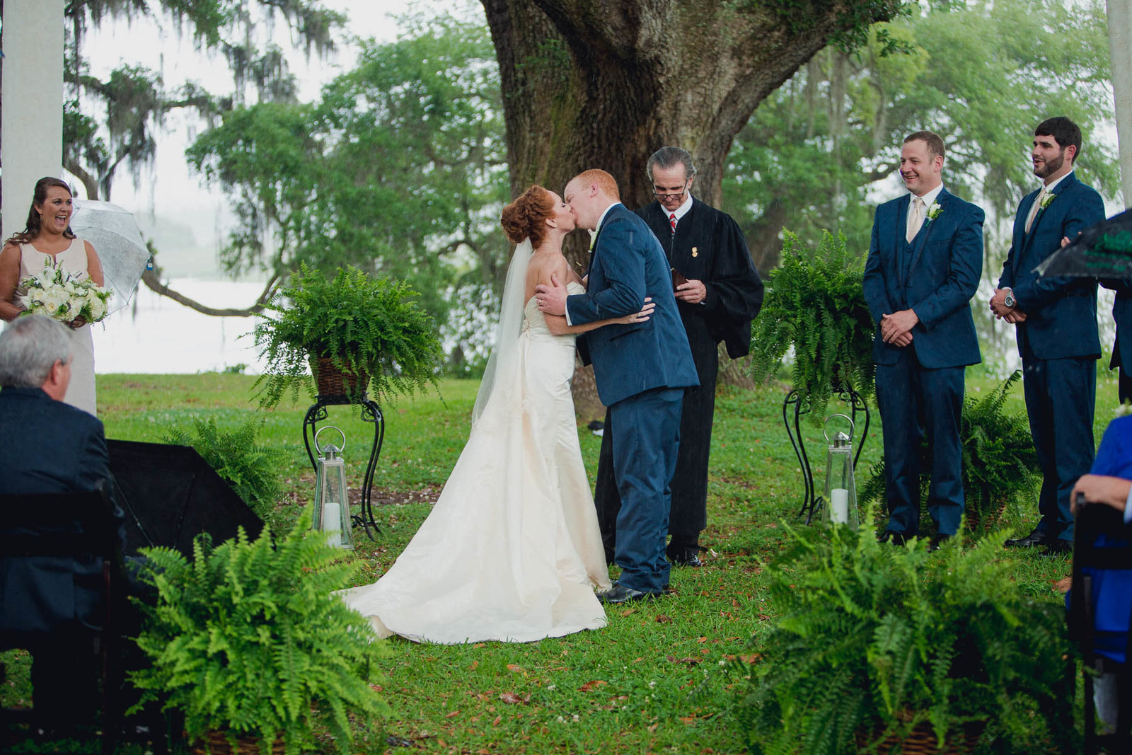 Bride and groom kiss, Old Wide Awake Plantation, Charleston, South Carolina