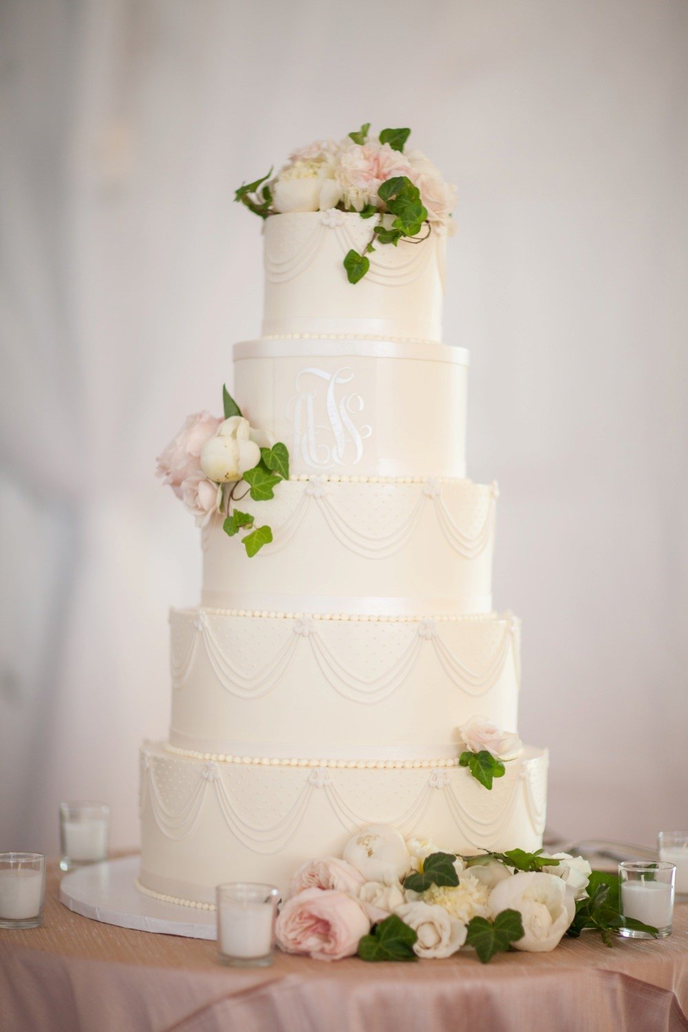 Classic white fondant 5 tier wedding cake for wedding at the Eisenhower House in Newport, RI