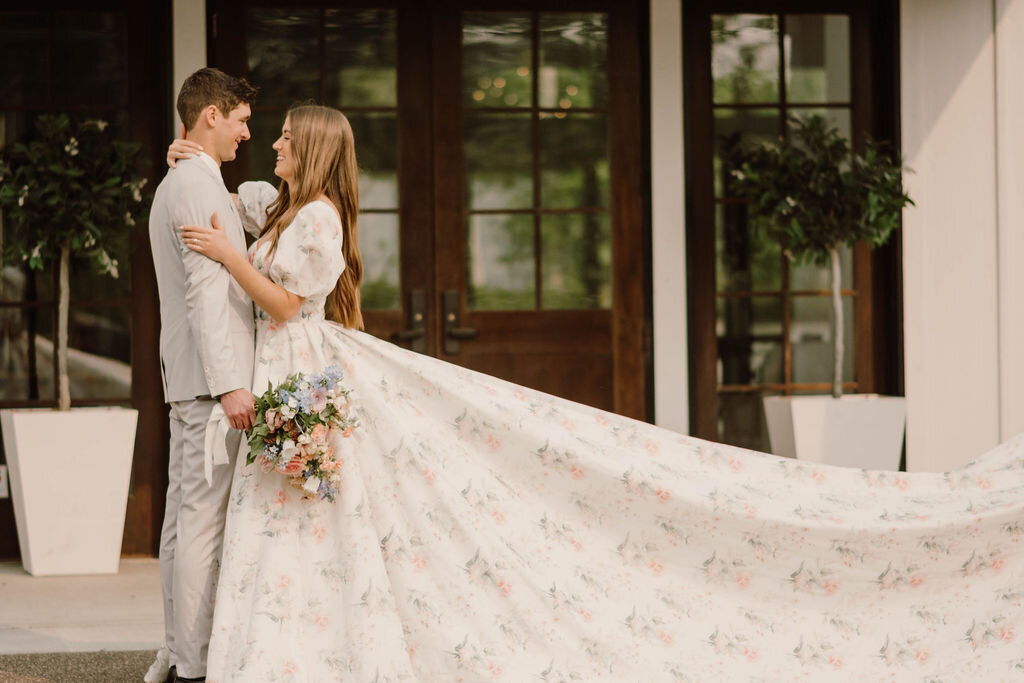 Whimsical floral wedding dress with a flowing train