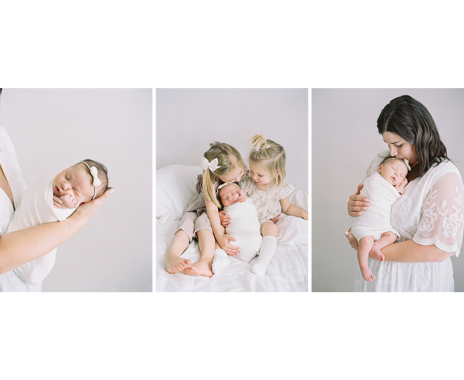 photo of sisters holding new baby in a white studio on a bed taken by Milwaukee photographer, Talia Laird Photography