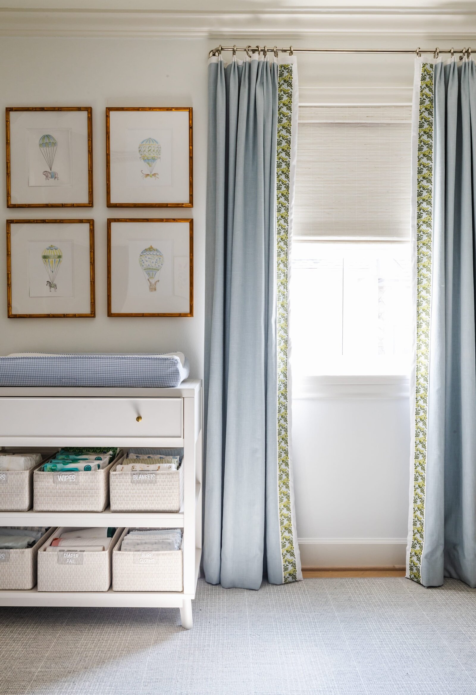 vision and hammer nursery with blue window curtains